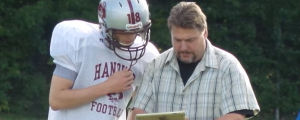 HS football coach shows a player video using Reveal